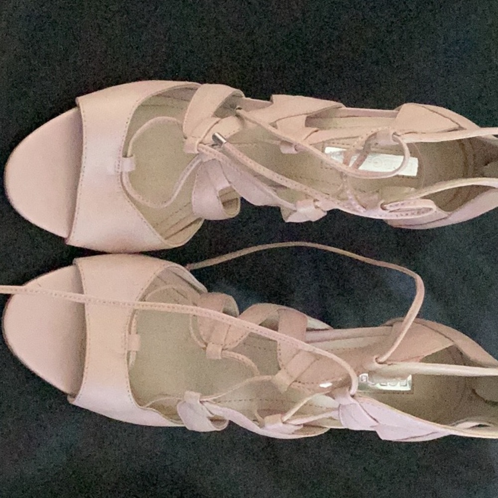 BCBGeneration tie up sandals size 7.5 color is a very light pink.